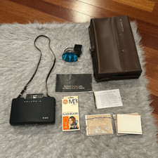 Polaroid vintage 1967 camera with case, cold clip, flash bulbs and photo paper