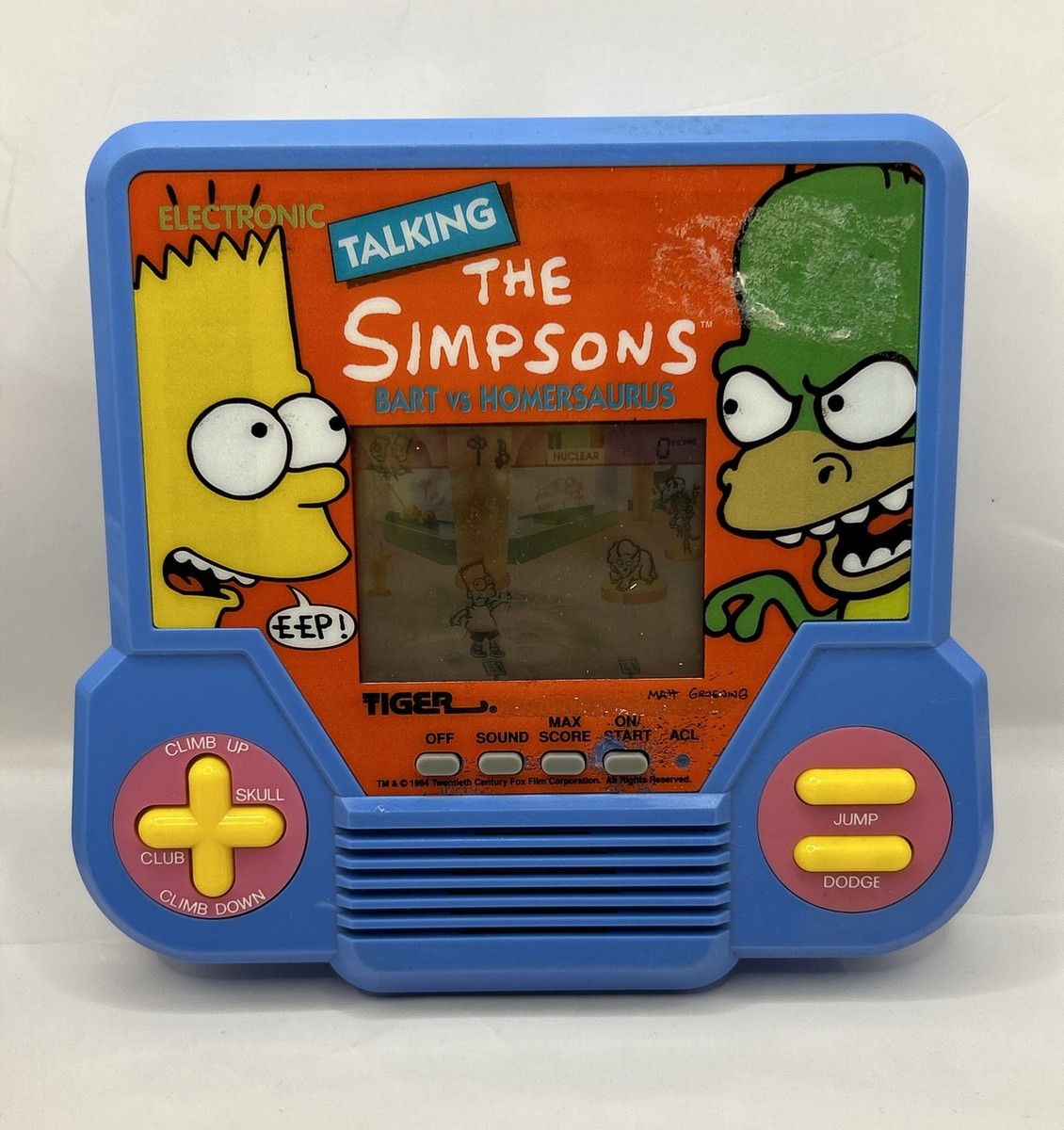 1994 Tiger Electronics The Simpsons Bart vs Homersaurus