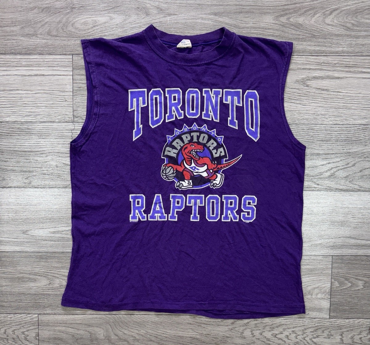 Vintage 1990s TORONTO RAPTORS NBA Graphic T Shirt Sleeveless Men's XL Purple