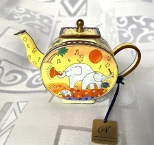 Trade Plus Aid. A miniature Charlotte di Vita Enamel Teapot 'New World Symphony'