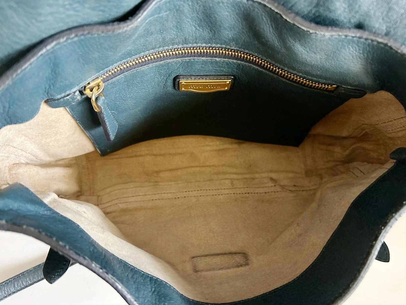 Borsa a tracolla Miu Miu Lake in pelle blu con patta a scatto