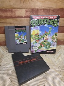 Teenage Mutant Ninja Turtles Nintendo NES completo di scatola cib testato funzionante