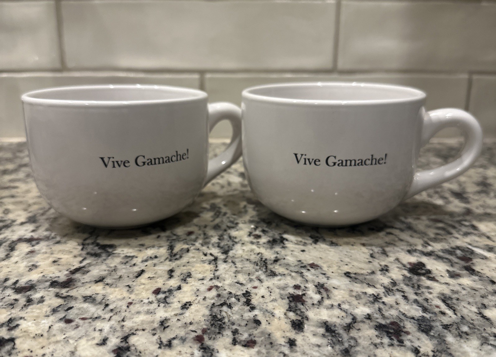 2 Vive Gamache M Ware China. Louise Penny memorabilia Mugs.