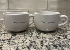2 Vive Gamache M Ware China. Louise Penny memorabilia Mugs.