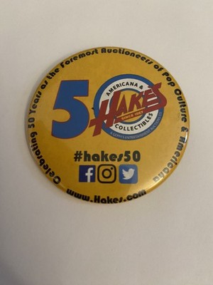 Hake s Celebrating 50 Years Auctioneers Pin Back Button P201