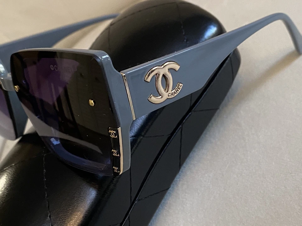 Gafas de sol Chanel para mujer de gran tamaño con acento gris/dorado y lentes marrones Foto 2 de 4