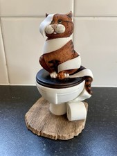 Comic & Curious Cats All Tied Up. Ginger Sitting On Toilet