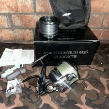 Mulinello singolo Shimano Aero Technium Mgs 12000 Xtb, con scatola e bobina di ricambio. Ottime condizioni