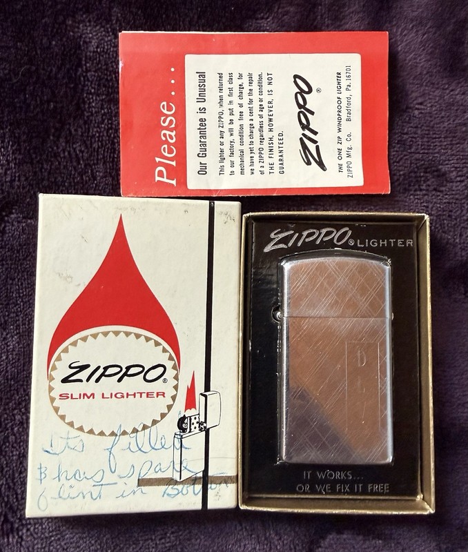 Vintage 1970’s ZIPPO Slim Lighter # 1620 H.P. Crisscross engraved "DLV”