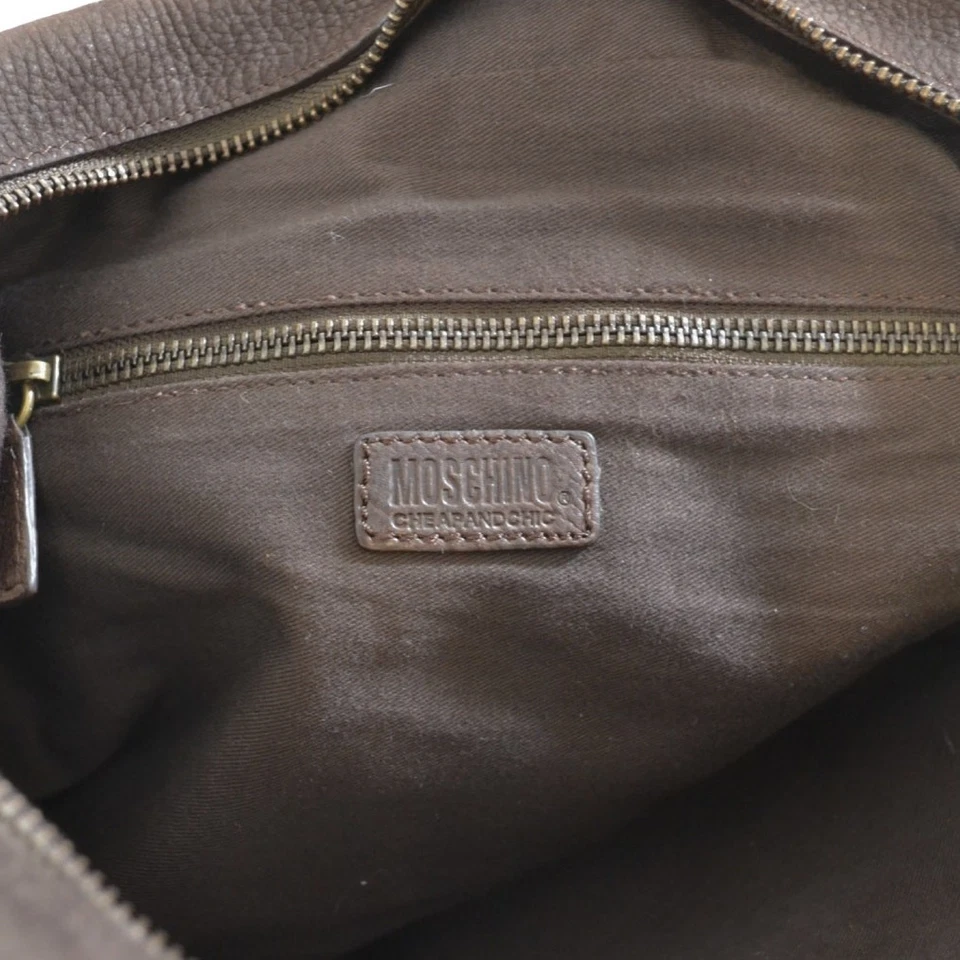 Cartera de cuero marrón Moschino vintage barata y elegante, anillos de latón, 2 bolsillos Foto 2 de 4