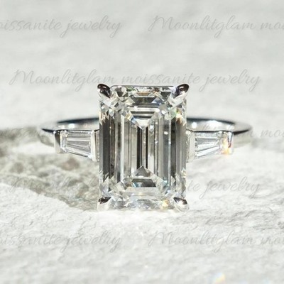 4.20 CTW Emerald Cut Three Stone Moissanite Ring In 14K White Gold Plated