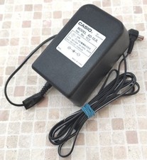 CASIO AC adapter AD-12JL with torn coating