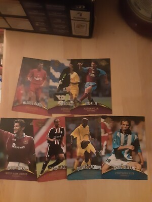 SIEBEN VERSCHIEDENE PREMIER GOLD 2001 TRADING CARDS