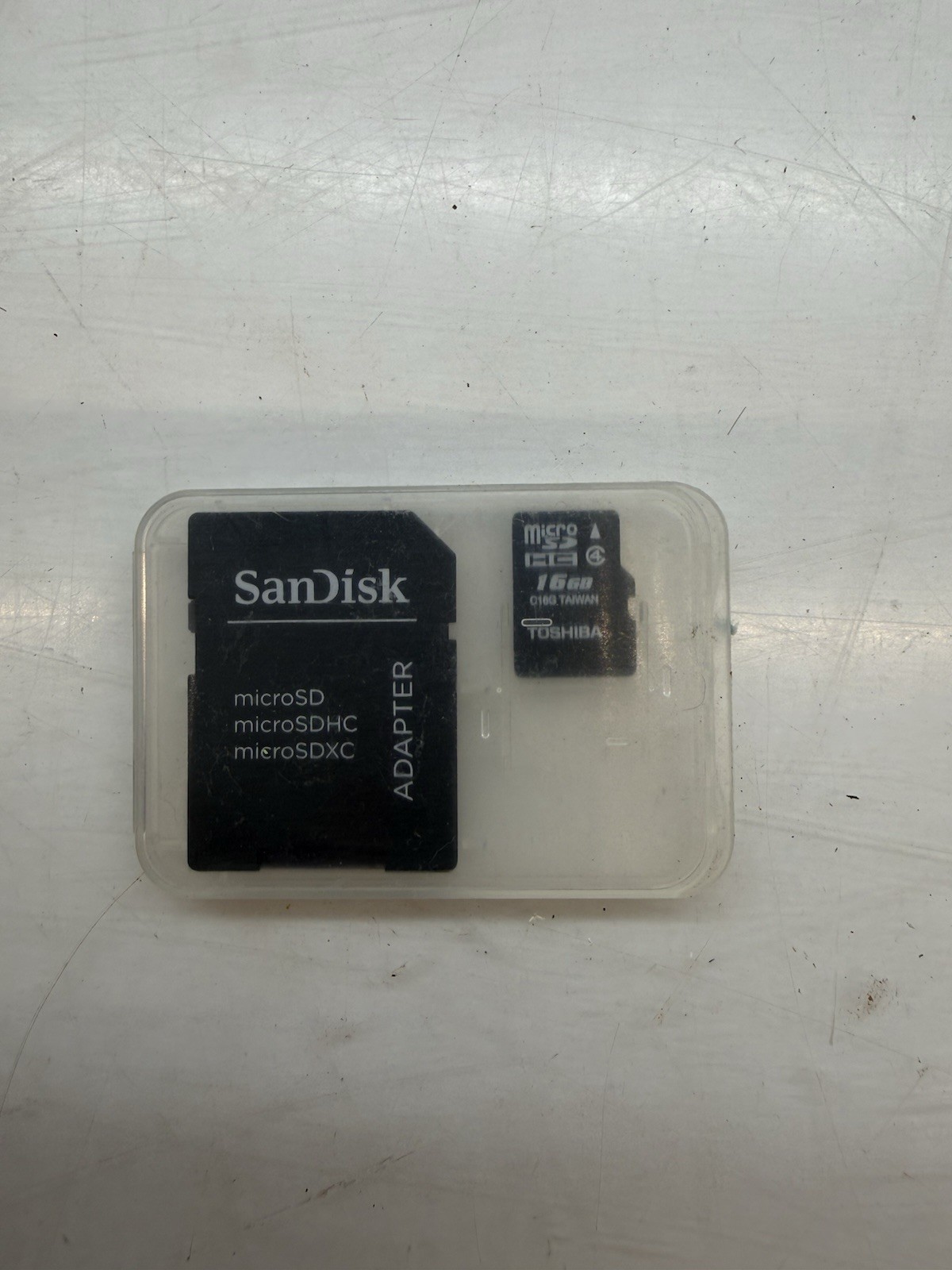 Toshiba 16GB Micro SD Card With a SanDisk Adapter