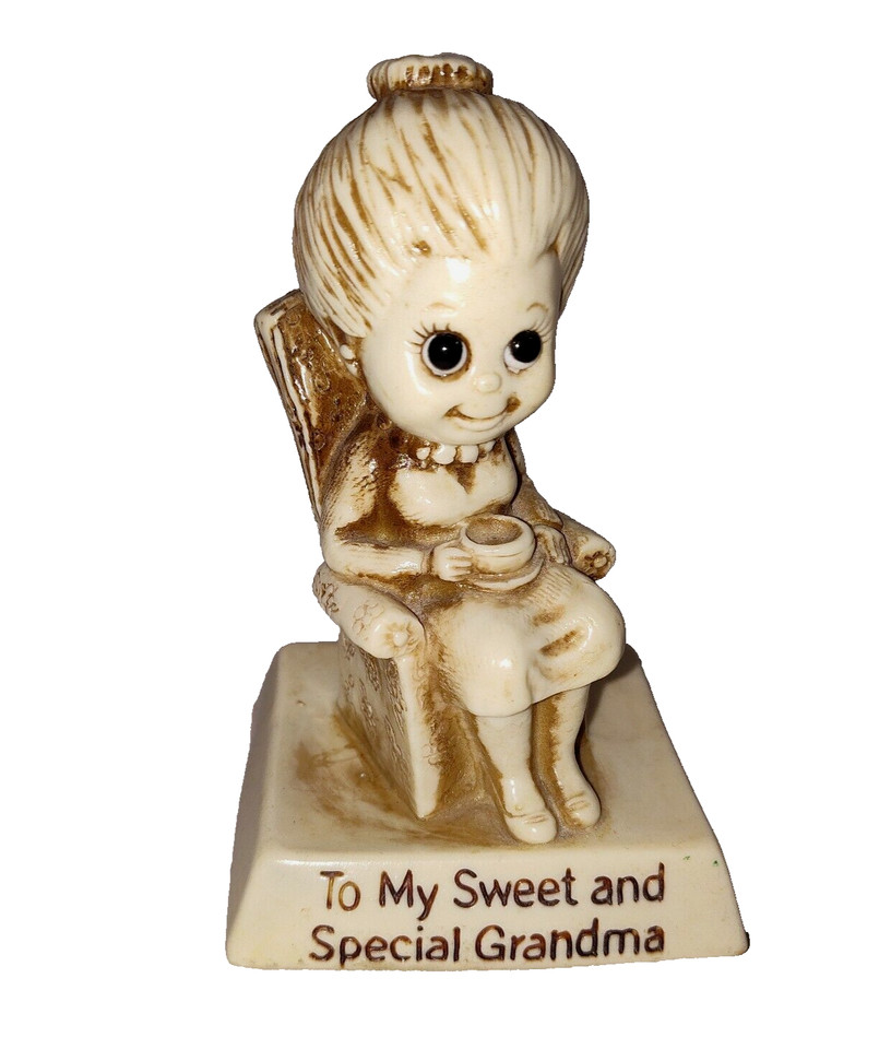 A genuine 1970s drugstore kitsch grandma figurine — the kind of weird, specific charm that makes white elephant rounds erupt.