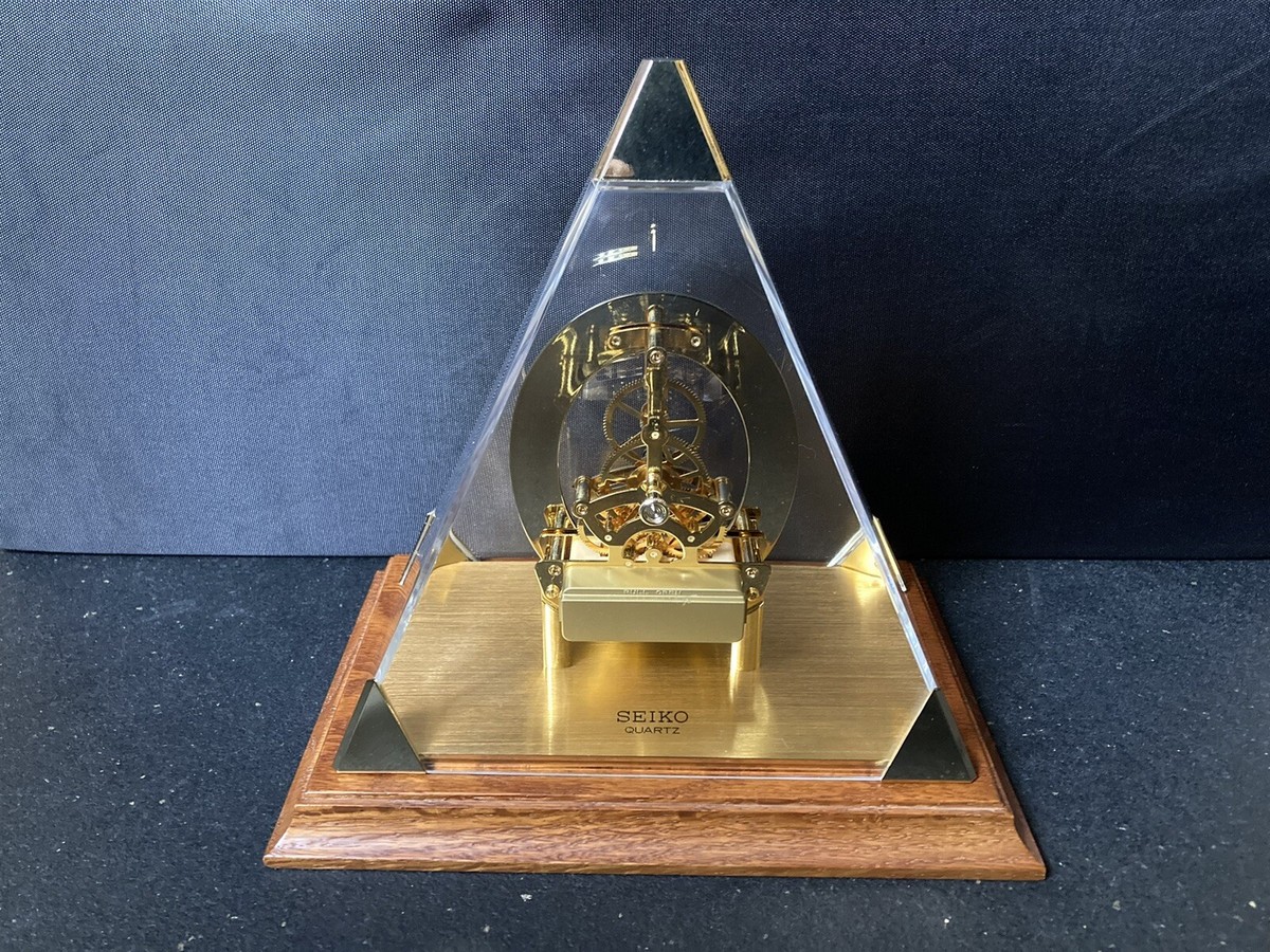 SEIKO Pyramid Quartz Skeleton Clock With Original Wood Base VERY RARE | eBay SEIKO Pyramid Quartz Skeleton Clock With Original Wood Base VERY RARE | eBay