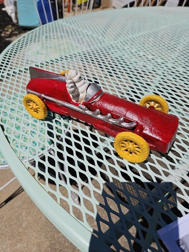 Michelin Man Cast Iron Car