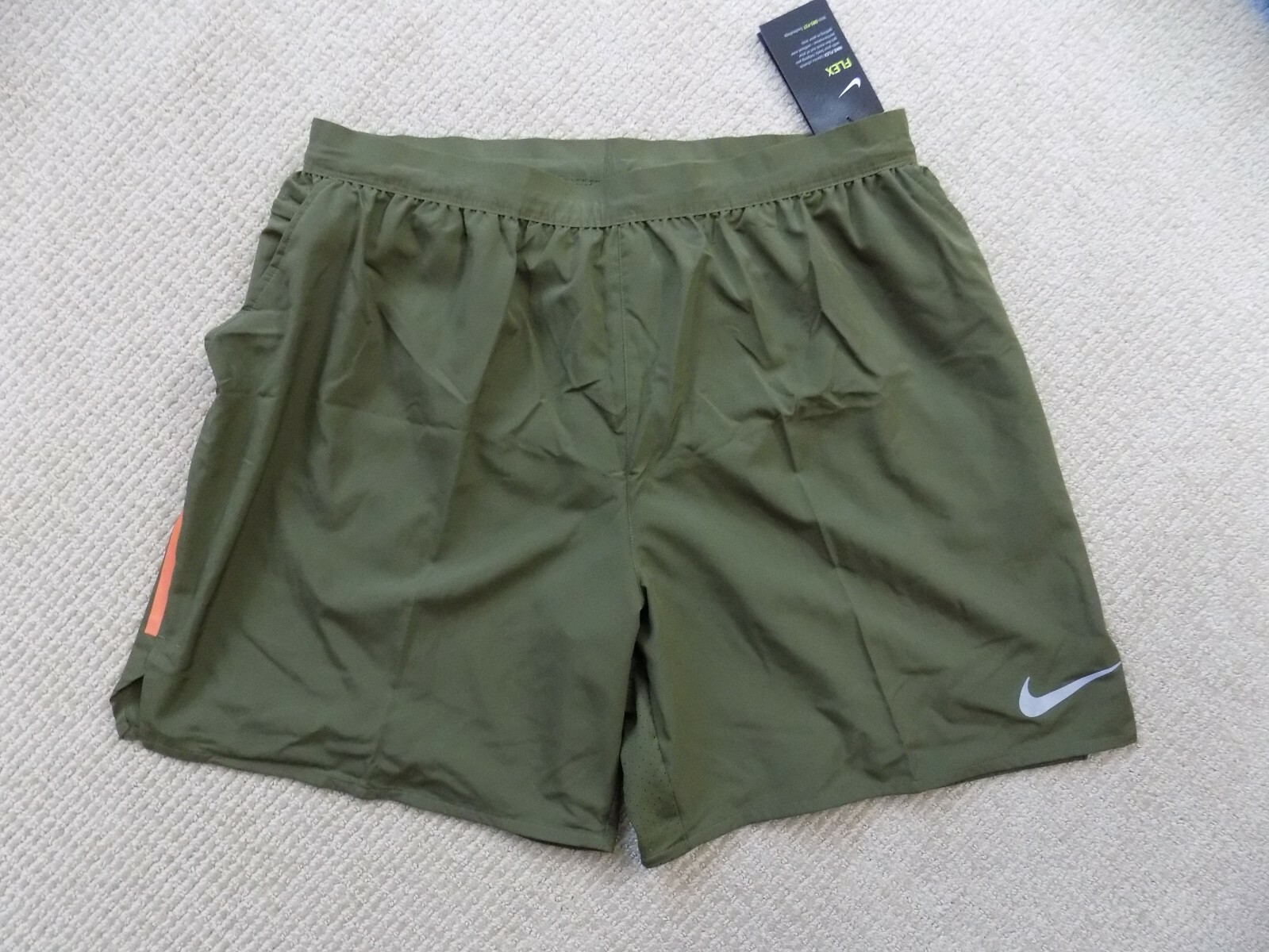 nike flex stride 7in