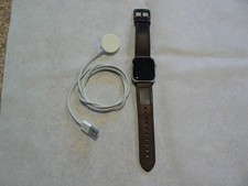 Apple Watch Series 4: 40 mm Silver Aluminum Case with Leather Band - GPS LTE