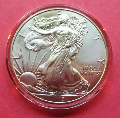 2015 AMERICAN SILVER EAGLE, UNCIRCULATED. NO BOX OR COA. IN CAPSULE.