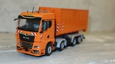 WSI 02-3791 in 1:50, MAN TGX 8x2 con srotolatore Palfinger e contenitore, NUOVO in OV