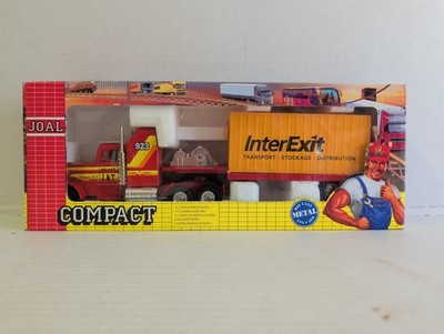 JOAL INTERNATIONAL TRANSPORT AUX SEMI TRUCK WITH CONTAINER LOAD 1:50 Diecast 