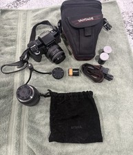 Pentax SF10 Body, 2 Sigma Lenses, Case And Mini Tripod
