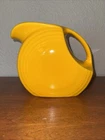 Vintage daffodil yellow FIESTA WARE Pitcher With Ice Lip.