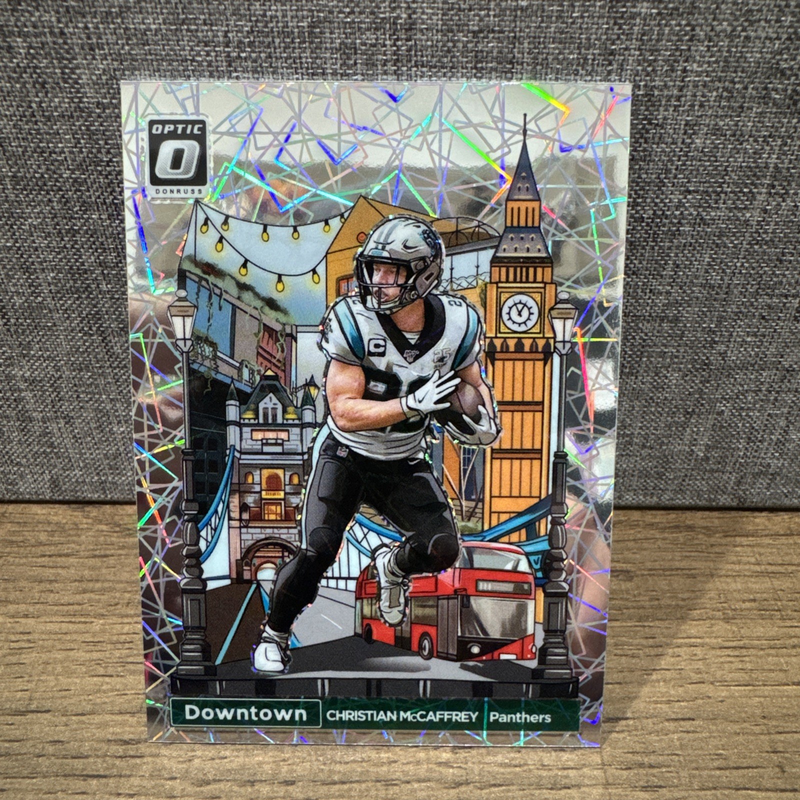 2023 Panini Donruss Optic - International Downtown Christian McCaffrey #9