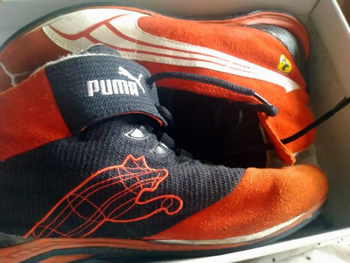 red ferrari trainers