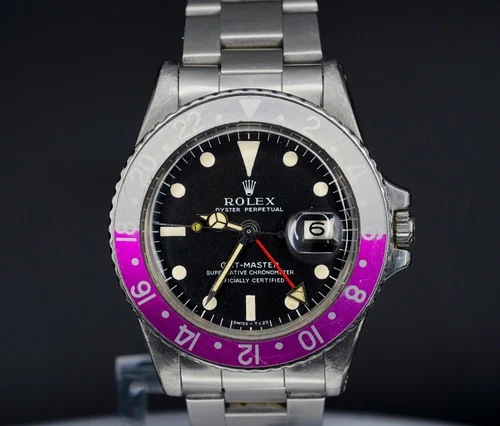 1968 Rolex GMT-Master 1675 FUSCIA INSERT Long “E” Stainless Steel Black Dial!