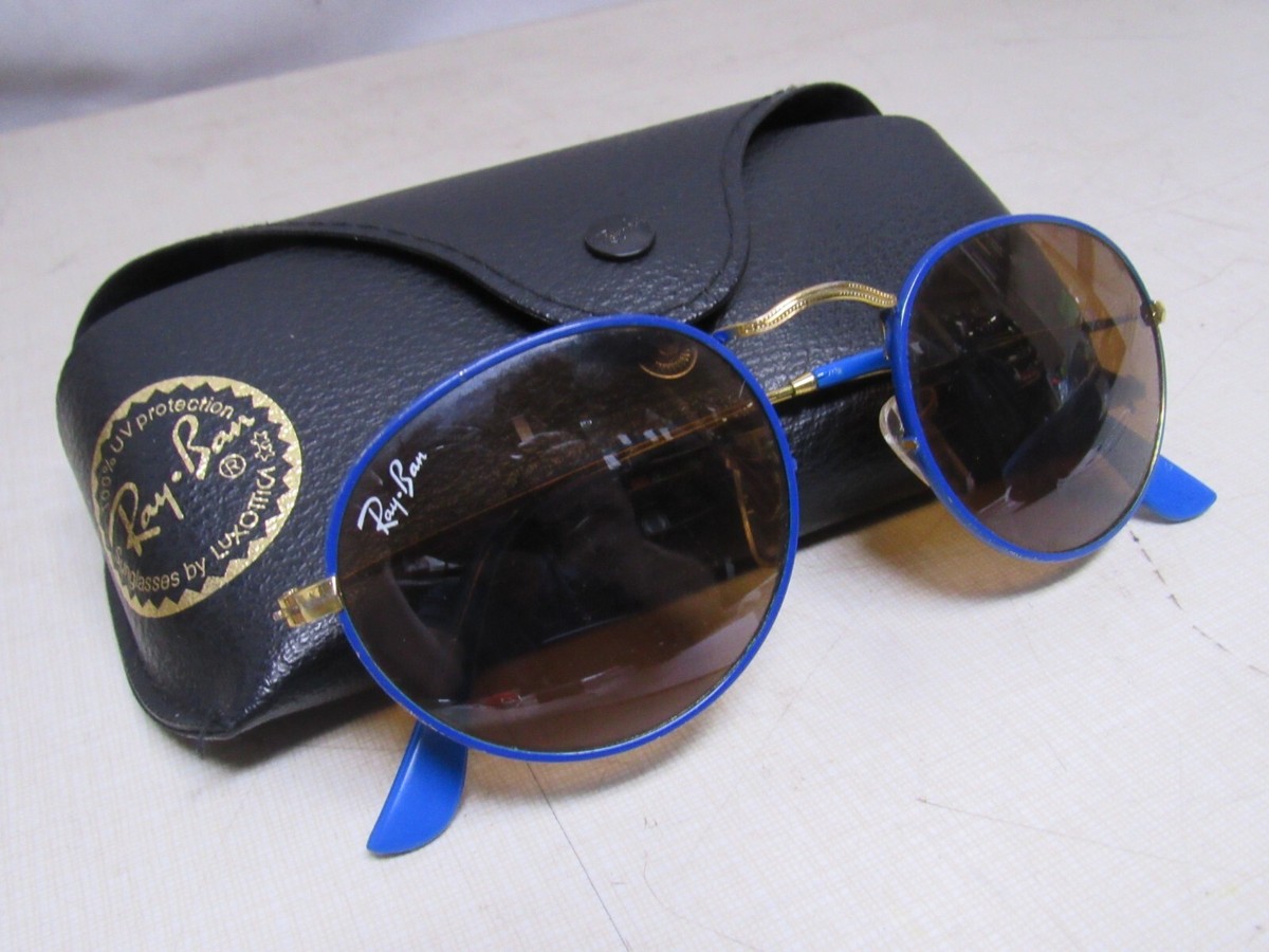 Selling gold and white round frame with blue lens Ray-Bans. Worn one time. 11361_f.jpg main image 4