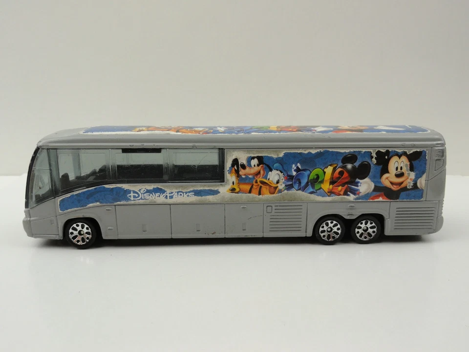 2012 Matchbox Disney Parks Motor Coach Industries Bus (Gray) w/ WEAR - Image 3 of 4