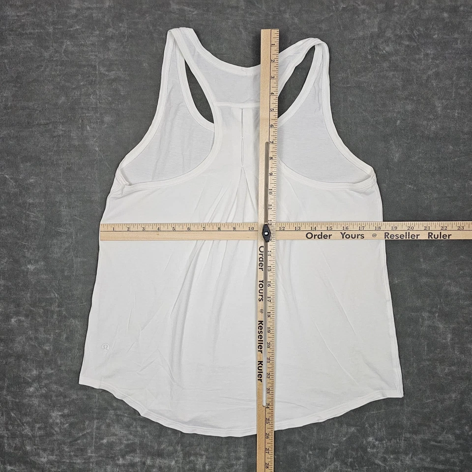 Camiseta sin mangas Lululemon para mujer grande blanca espalda deportiva calce suelto yoga camisa atlética Foto 4 de 4