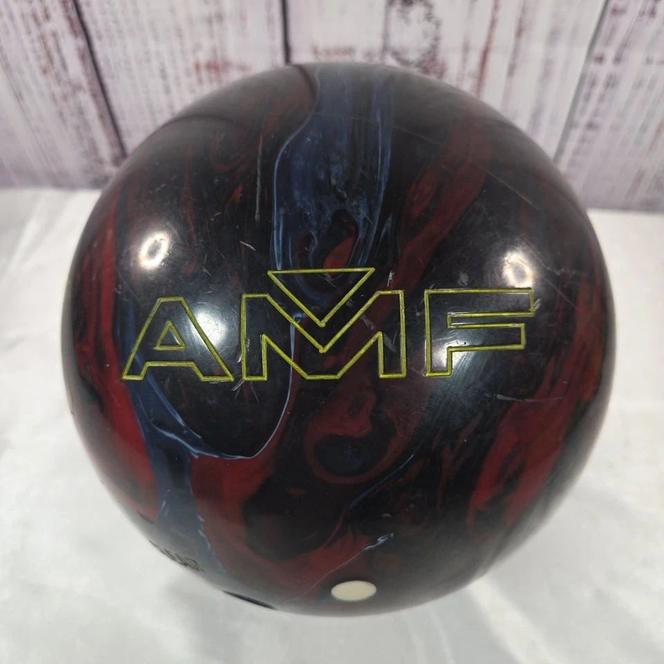 Bola de boliche AMF Titan edición sólida - 15 lb, remolino azul/rojo, perforada 3 agujeros Foto 4 de 4