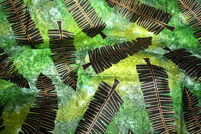 PRINTED BATIK-LARGE TROPICAL LEAVES IN BLACK AND GOLD ON GREEN -  COTTON FABRIC