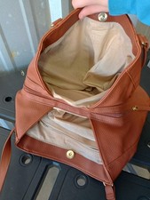 brown leather crossbody bag with 2-3 pockets
