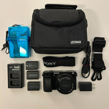 Sony Alpha 6000 camera 3 batteries, charger, bag, cleaning kit. barely used