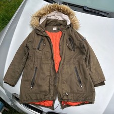 db established 1962 brown zip up coat