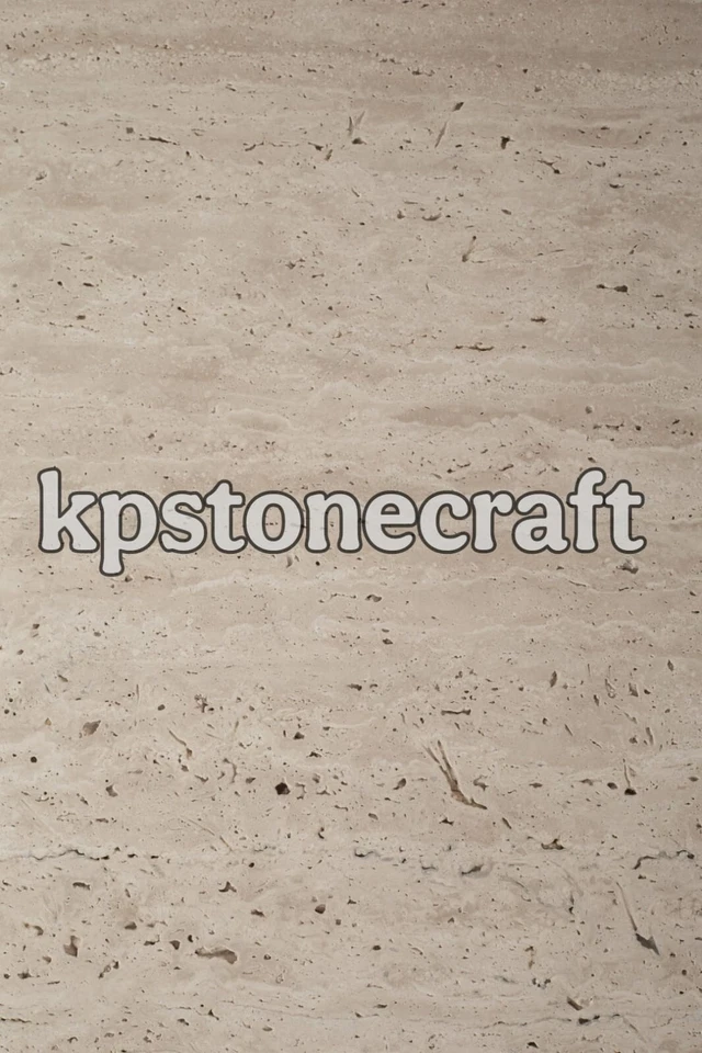 Mesa de centro Harlowe de travertino irregular - Mesa redonda de piedra de lujo hecha a mano Foto 4 de 4