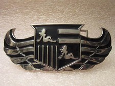 NEW POLISH BLACK TRUCKER GIRL CREST BELT BUCKLE BOTTLE OPENER 5.25 X 2 VIC-THOR1