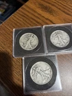 half dollar walking liberty silver / lot of three / 1942 -1944-1941 / with cses