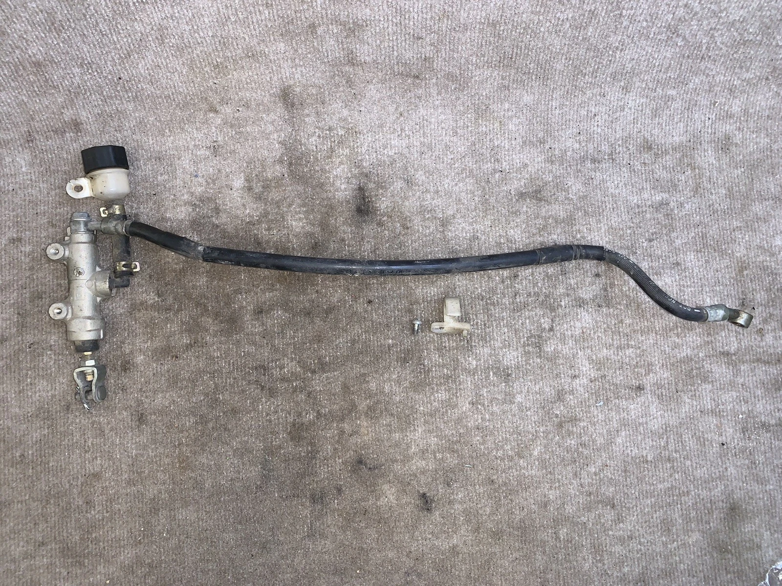 2001 Kawasaki KX250 KX 250  rear brake master cylinder  99 00 01 02 OEM
