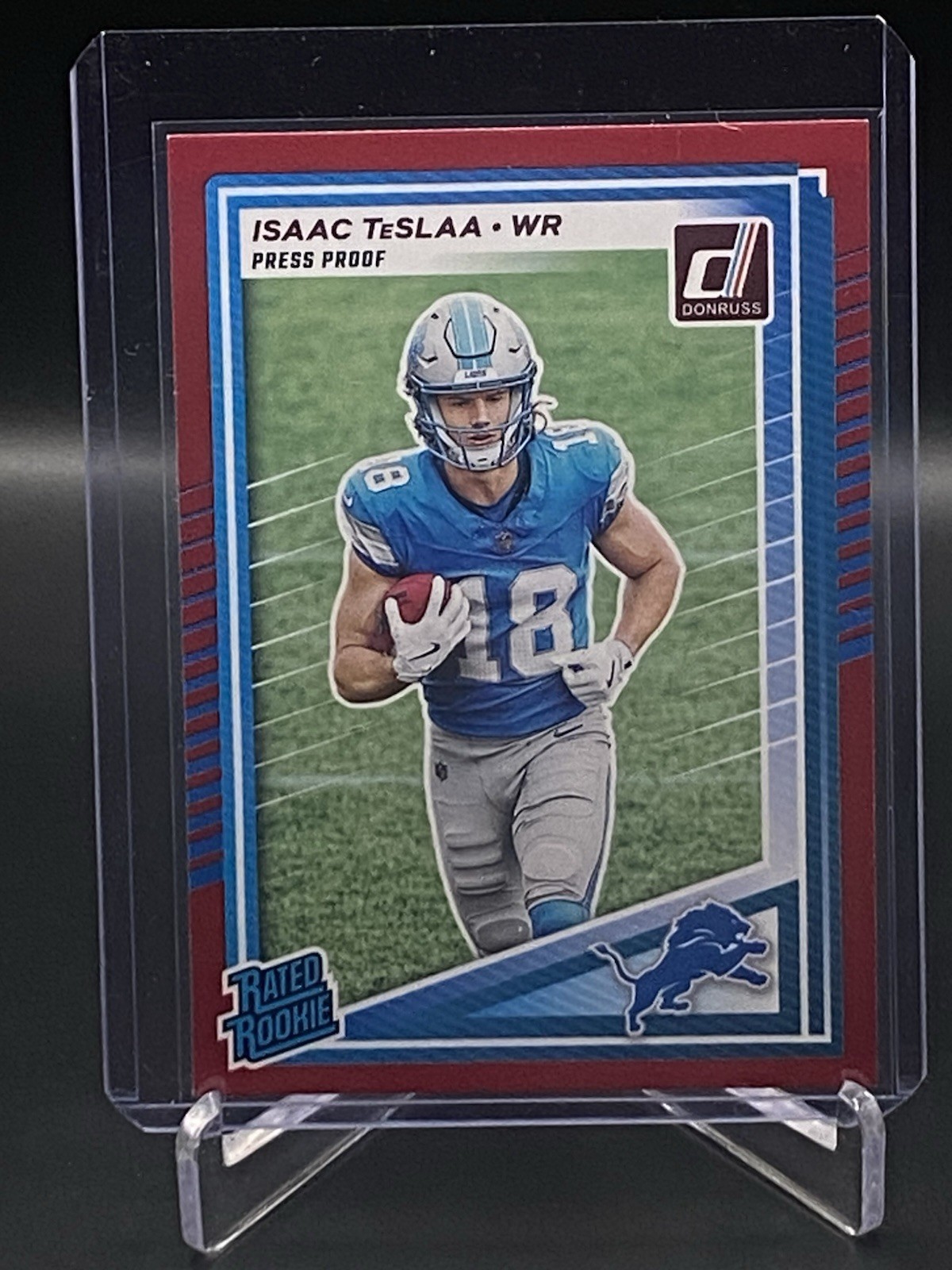 2025 Donruss Football Rated Rookie Isaac TeSlaa #338 RC Red Press Proof Lions