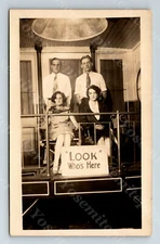 Wd2 Postcard RPPC Early 1900's Frown Couples psing " Look who's here " 345a