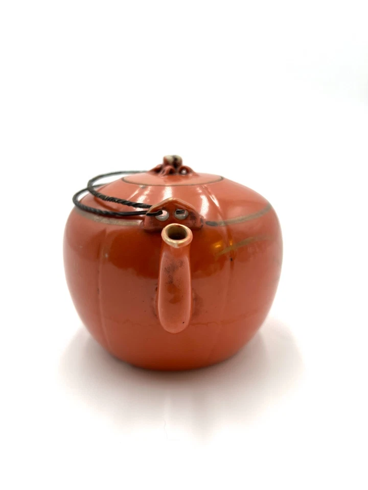 Antigua tetera china con forma de melón coral naranja dorado con inscripción Foto 3 de 4