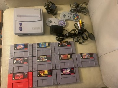 Super Nintendo SNES JR Console SNS-101 Bundle With 10 Games And 2 Controllers.
