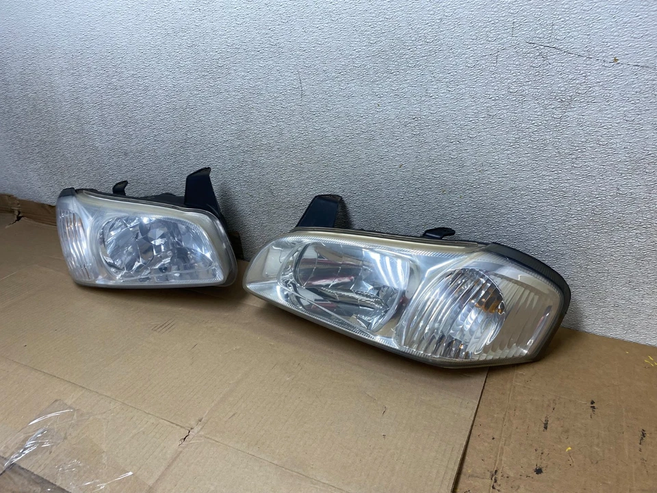 Juego de faros halógenos laterales izquierdo+derecho Nissan Máxima 2000 a 2001 U2762 DW Foto 2 de 4