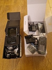 a trio of vintage mobile phones. Blackbery curve. Nokia105