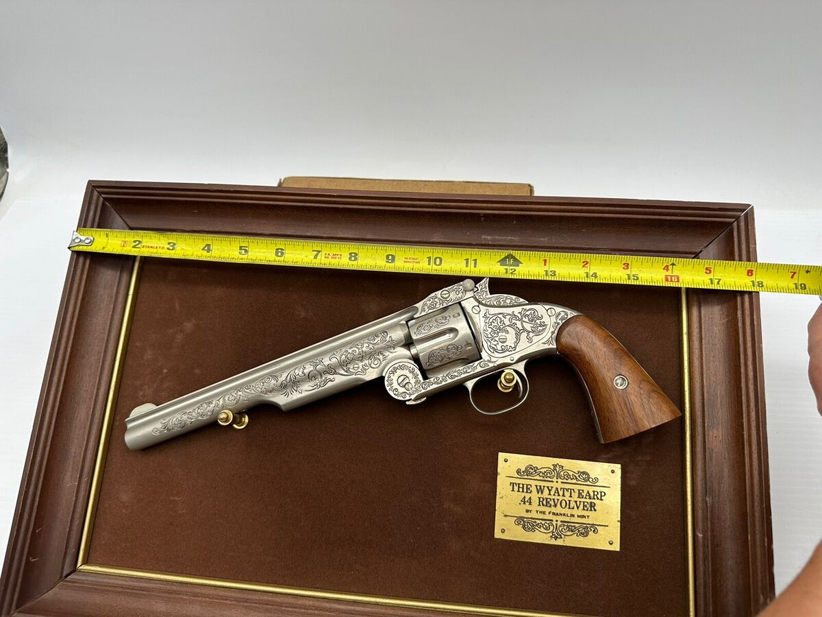 The Wyatt Earp .44 Revolver by The Franklin Mint W/ Display The Wyatt Earp .44 Revolver by The Franklin Mint W/ Display